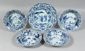 FOUR 18TH CENTURY CHINESE BLUE AND WHITE PORCELAIN BOWLS, each decorated with a fishing scene to the