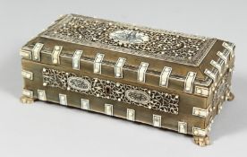 A SMALL VISAKHAPATNAM HORN AND BONE ONLAID SANDALWOOD RECTANGULAR CASKET, the hinged lid with carved