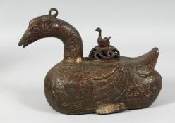 AN UNUSUAL CHINESE BRONZE CENSER AND COVER in the form of a mythical winged beast, with mark to
