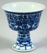 A FINE CHINESE DAOGUANG STYLE BLUE AND WHITE PORCELAIN STEM CUP, decorated with characters and
