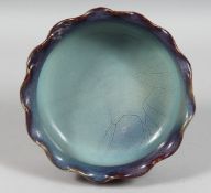 A CHINESE PETAL-FORM JUN WARE PORCELAIN BOWL, with waved rim. Diameter 16.5cm