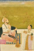 An Indian miniature painting on paper, depicting a dignitary with servant, 11.5
