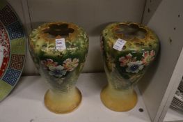 A pair of decorative vases.