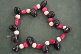 A decorative bead necklace.