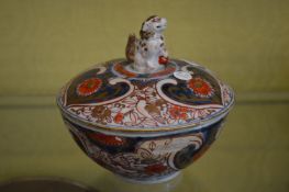 An Imari bowl and cover.