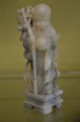 A carved soapstone figure of Shouxing.