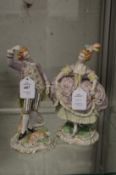 A good pair of Dresden porcelain figures of a man and a woman.