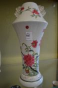 A Famille Rose vase.