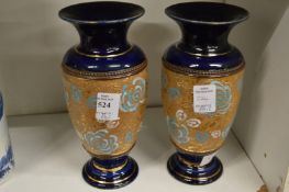 A pair of Royal Doulton vases.
