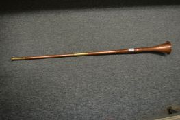 A copper and brass hunting horn.