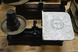 Cast iron scales and weights.