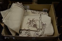 A tablecloth and napkins.