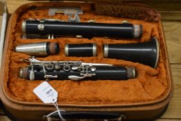A cased clarinet.