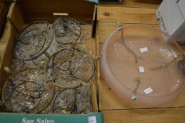 Five brass and cut glass bag chandeliers and a pink glass shade.