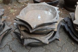 Six old Indian wooden food bowls.