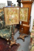 A pair of 19th century mahogany pole screens.
