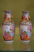 A pair of Canton vases.