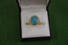 A decorative dress ring stamped 14k.