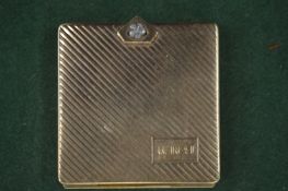 A ladies' compact in a fitted leather case, the compact stamped 14k.