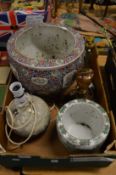 Two Chinese jardinieres and two table lamps.