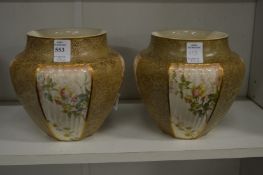 A pair of unusual Royal Doulton vases.