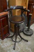 A bentwood swivel highchair.