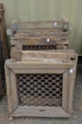 A quantity of Indian hardwood framed wrought iron window grilles.