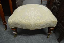 An upholstered stool.