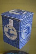 A Japanese blue and white porcelain stacking boxes and cover.