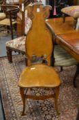 An unusual carved oak hall chair.