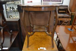 A mahogany two tier centre table.