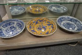 Three modern Chinese dishes.