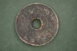 A Chinese carved nephrite / jade archaic style bi disc.