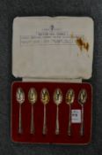 A cased set of 1935 Silver Jubilee silver coffee spoons.