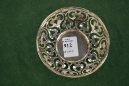 A small silver bonbon dish.