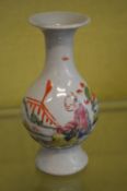 A small Famille Rose vase.