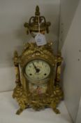 A modern ormolu mantle clock.