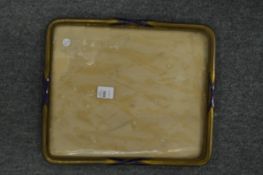 An ormolu and enamel photograph frame.