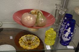 A pair of Mary Gregory style blue glass vases and other glassware.