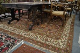 A good large Persian design carpet, rust ground with stylized floral decoration 360cms x 310cms.