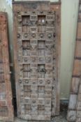 A good large pair of Indian carved hardwood doors with wrought iron strap work and bronze handles.
