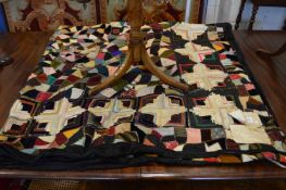 A patchwork bed cover.