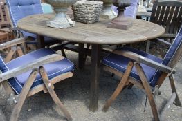 A hardwood patio table.