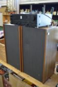 A Kenwood integrated amplifier and a pair of Philip's speakers.