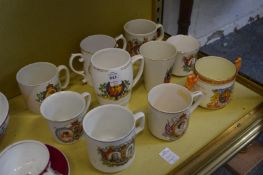 Ten Coronation mugs.