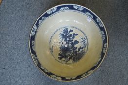 A large Japanese blue and white bowl.