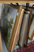 A quantity of paintings and prints.