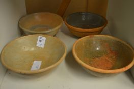 Four Chinese terracotta bowls.