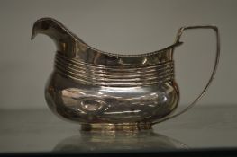 A Georgian silver milk jug.