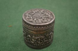 A small Indian silver pot and cover.